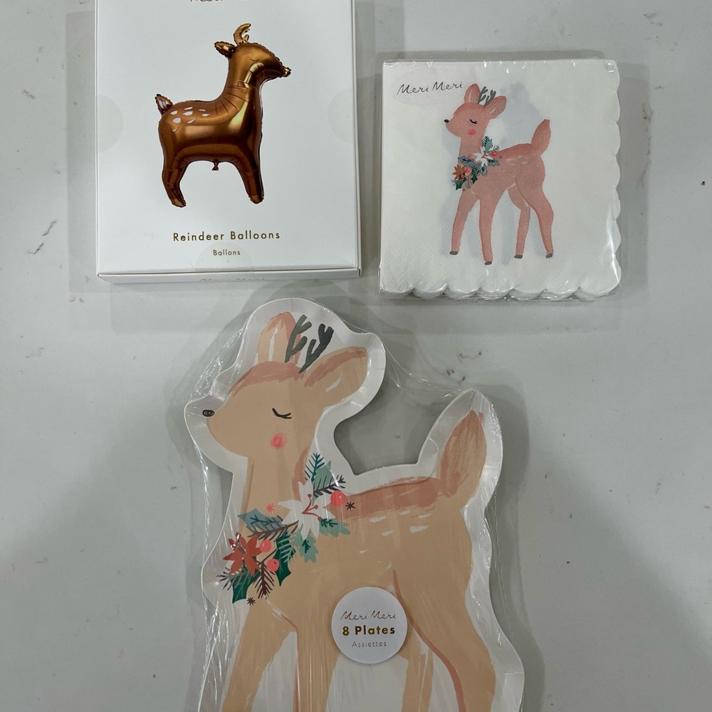 Meri meri reindeer plates, napkins and balloons. All brand new in packaging